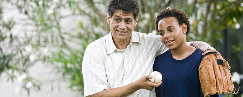 Father and son playing baseball