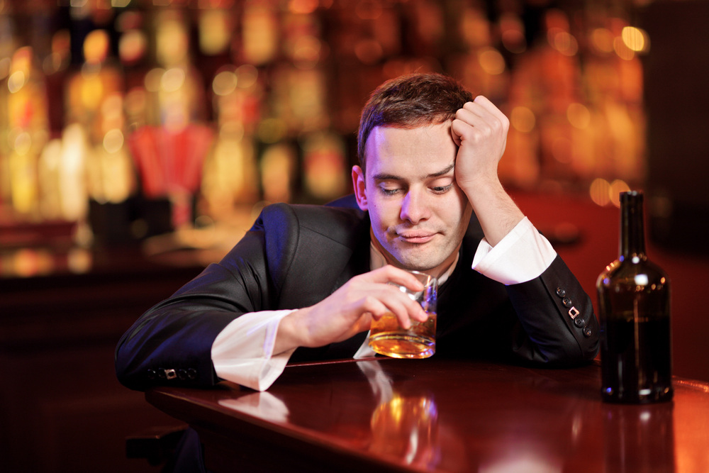 Man in bar (Shutterstock photo)