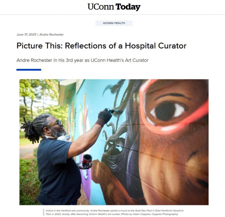 Image of Andre Rochester painting a mural.