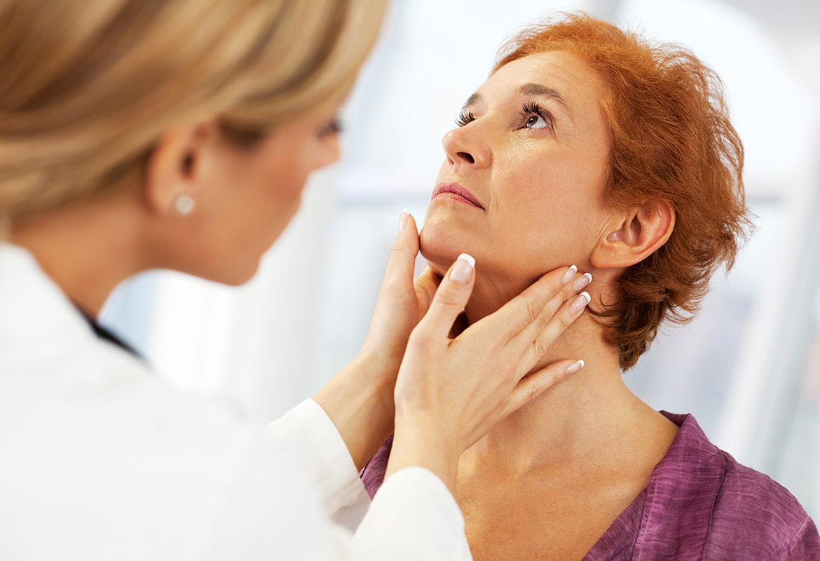 Female doctor examining her patient