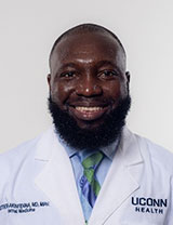 Stephen Akinfenwa, M.D.