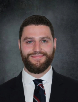 Charles Abrams, M.D.