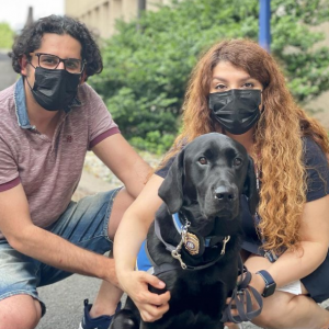 Regional Campus Facility Dog Officer Carson with students