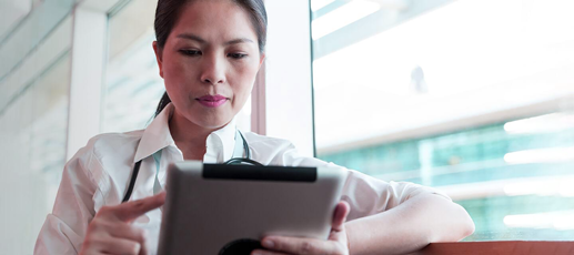 An employee working on a tablet