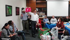 Immunology faculty, staff and students enjoy snacks and good company.