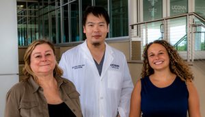 Dr. Laura Haynes standing with Drs. Zhichao Fan and Jenna Bartley