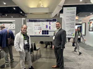 Ryan Beach presents his research on "The combination of EPA and naproxen suppresses colon tumorigenesis via altering the TME and promoting epithelial maturation in cancerous crypts." at the 2024 AACR in San Diego, CA. Pictured with his PI, Dr. Daniel Rosenberg.