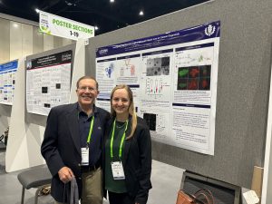 Caroline McNaboe presents her research on "An organoid model for investigating Lynch syndrome tumorigenesis." at the 2024 AACR in San Diego, CA. Pictured with her MD/PhD sponsor, Dr. Andrew Arnold.