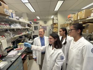 Doctor Arnold, and several of his student workers conducting a study in the Arnold Lab.