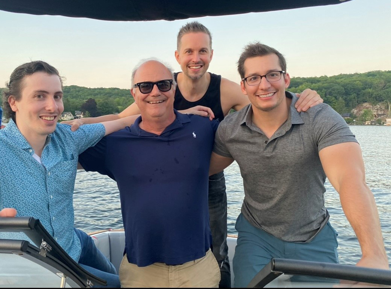 Robert Arciero, MD, with fellows on a boat