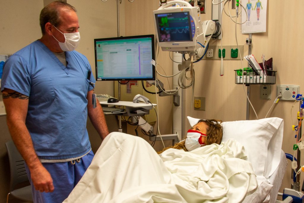 Michael Morelli, RN, with patient Leah Bergeron, the first patient to undergo outpatient plasmapheresis at UConn Health