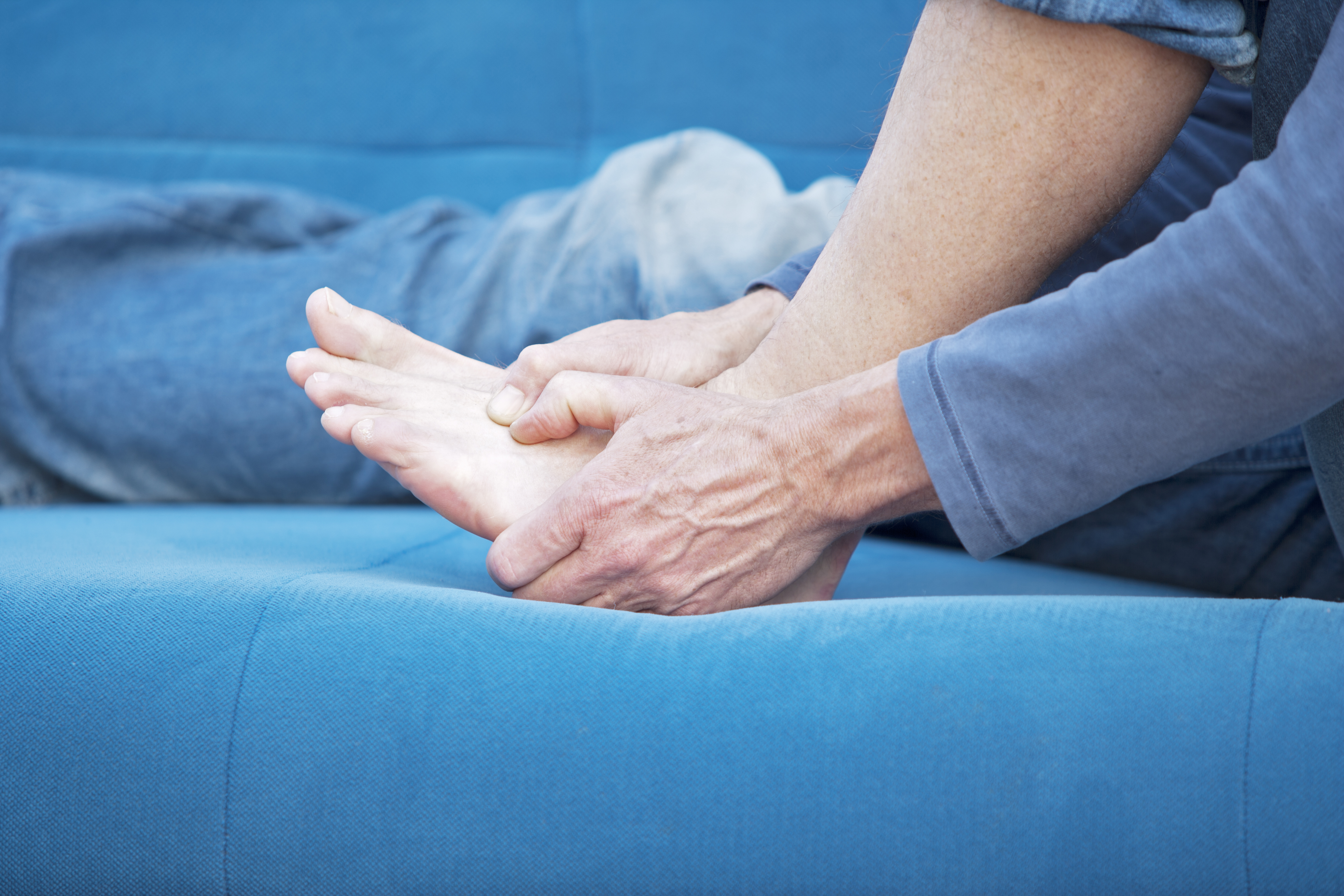 A male person, having metatarsal pain in his left foot. XXL size image.