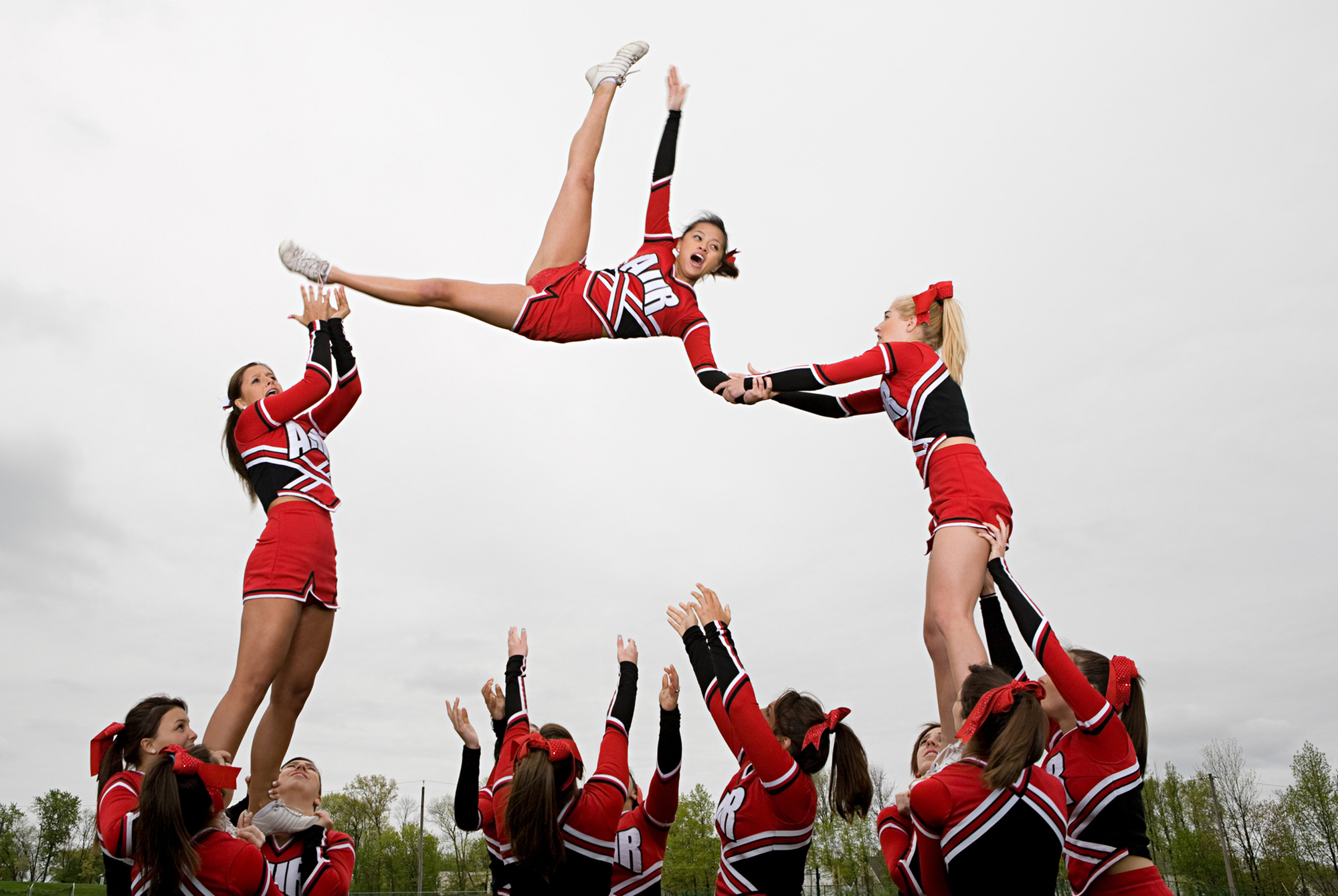 Cheerleaders performing routine