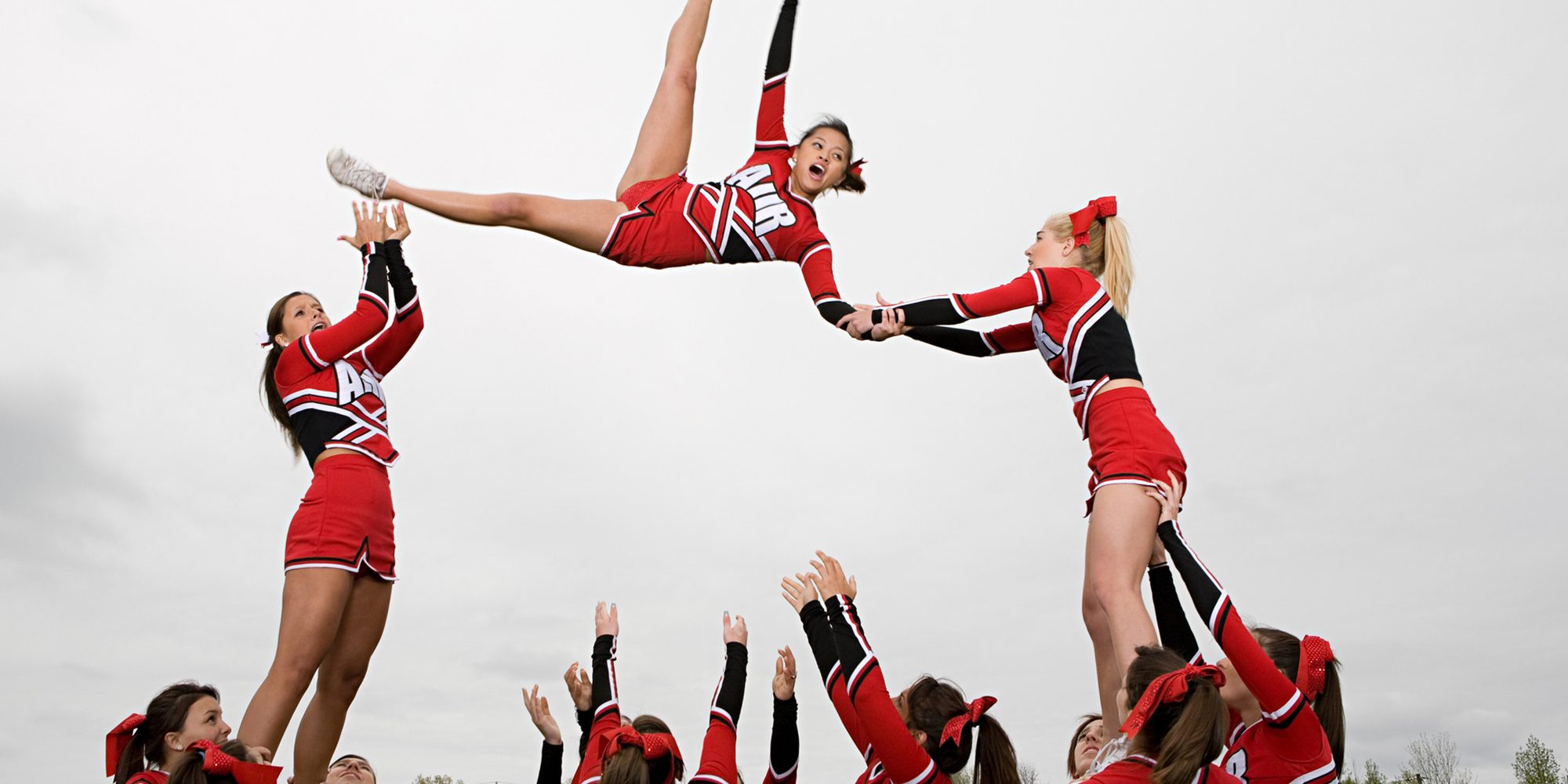 Cheerleaders performing routine