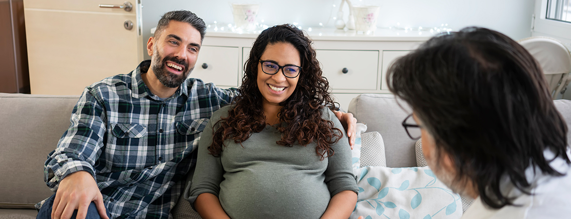 Provider visiting pregnant couple at their home