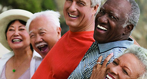 Photo of a group of seniors laughing.