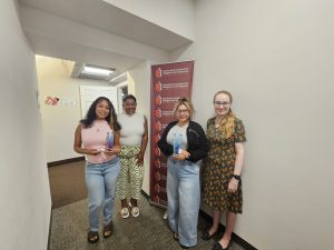 Image of CIRI staff members holding donated dental items