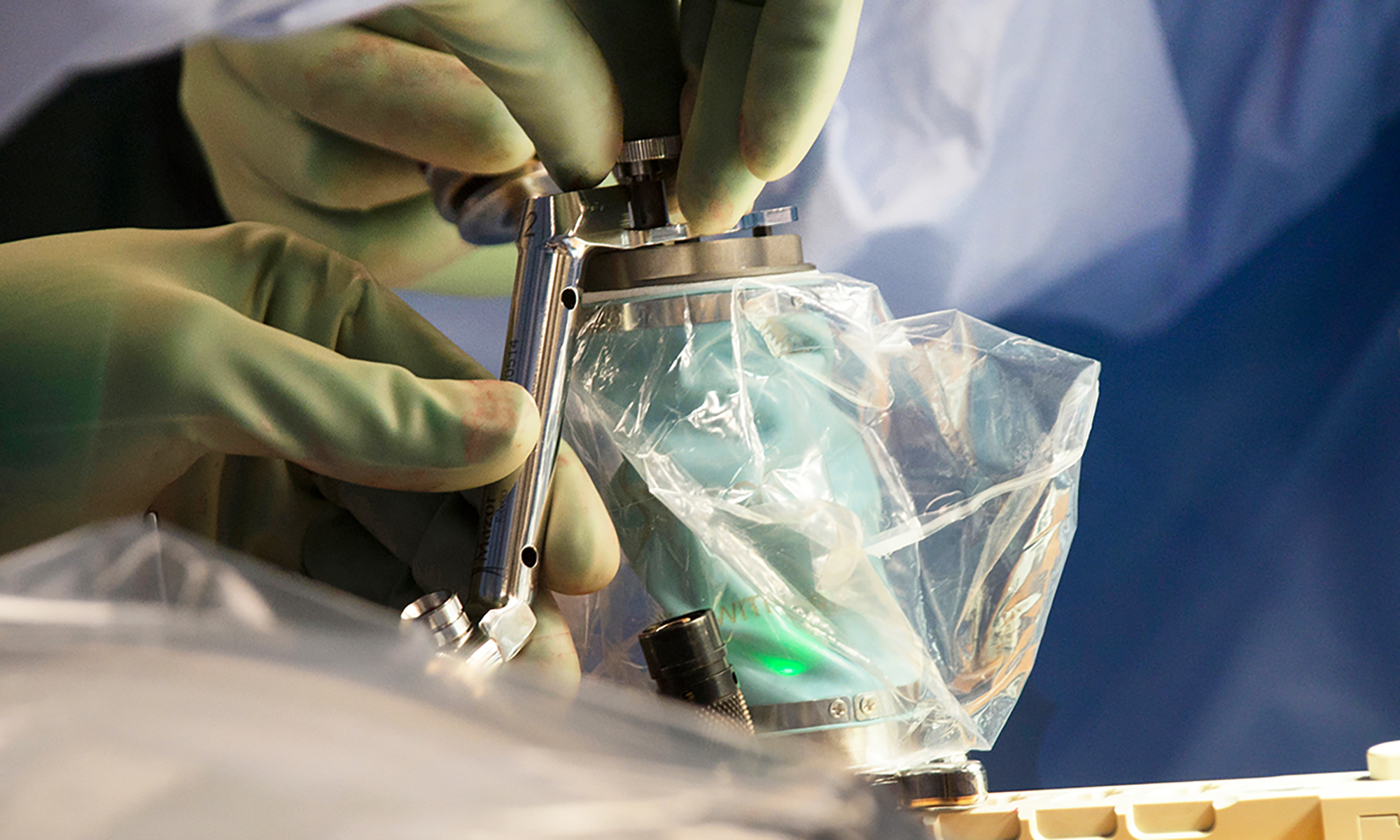 spotlight-robotic-arm A small robotic arm which helps pinpoint the most precise spot to place screws and other hardware into a patient’s spine