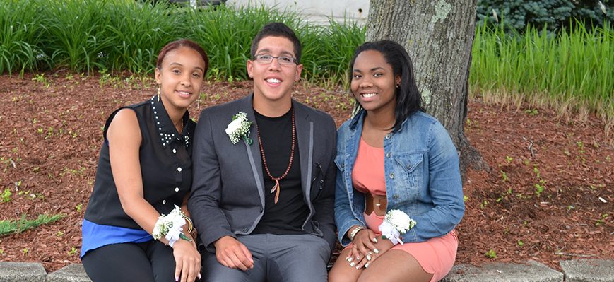 Three teens sitting together