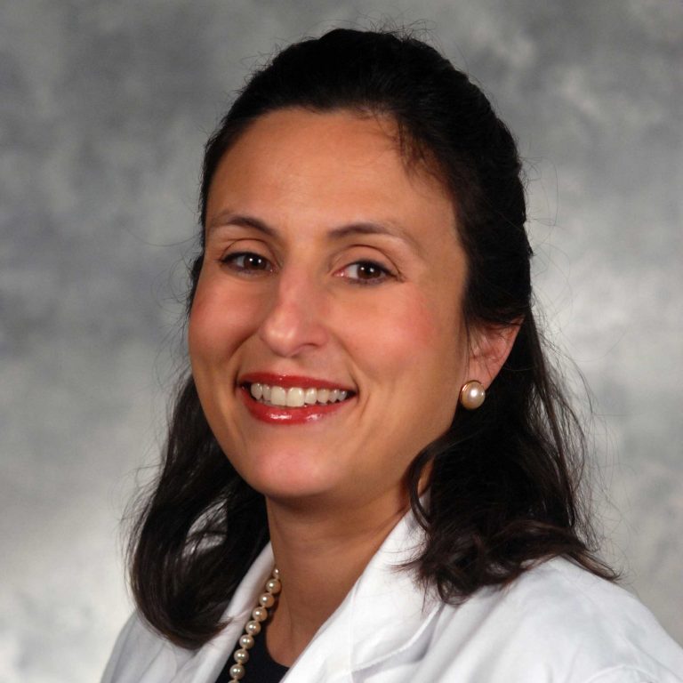 Dr. Jennifer Kanaan portrait, white coat