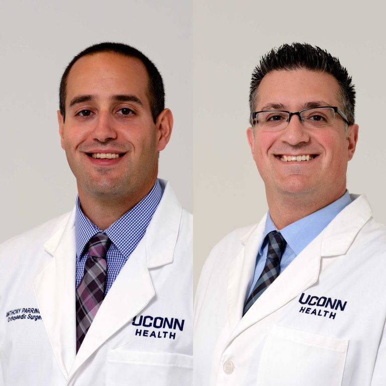 Drs. Anthony Parrino and Joel Ferreria portraits white coats