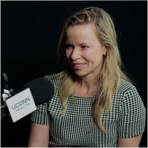 Dr. Jenna Kelsey in podcast studio